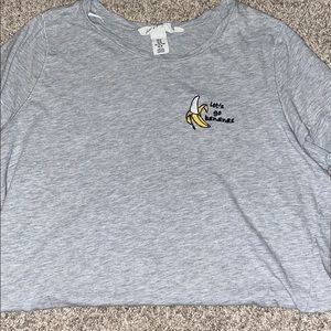 A gray let’s go bananas shirt.